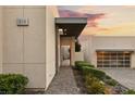 Modern home's front entry features sleek design and professional landscaping at 515 Serenity Point Dr, Henderson, NV 89012