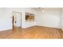 Spacious living room featuring wood floors, high ceilings, with ample natural light at 3673 Ian Thomas St # 201, Las Vegas, NV 89129