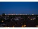Nighttime cityscape view of Las Vegas highlighting the city skyline at 5020 Spanish Heights Dr, Las Vegas, NV 89148