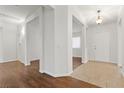 Bright foyer with tile and hardwood floors, leading to multiple rooms at 5577 Golden Leaf Ave, Las Vegas, NV 89122