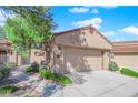 Attached two-car garage offers convenience and curb appeal at 7368 Mission Hills Dr, Las Vegas, NV 89113