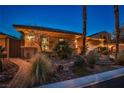 Charming home exterior with desert landscaping, and brick pathway leading to the front entrance at 3163 Elk Clover St, Las Vegas, NV 89135