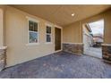 Welcoming entryway featuring stylish stone accents, a covered porch, and a secure front door at 3167 Biccari Ave, Henderson, NV 89044