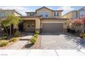 Charming two-story home with a well-maintained yard, and a two-car garage for convenient parking at 3167 Biccari Ave, Henderson, NV 89044