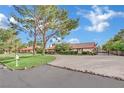 Beautiful single-story home featuring mature trees and a circular driveway at 3221 Montecito Dr, Las Vegas, NV 89120