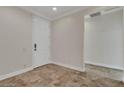 Welcoming foyer featuring neutral walls, tile flooring, and a coat closet for convenience at 3685 Australian Cloud Dr, Las Vegas, NV 89135