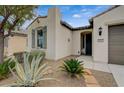 Close-up of the front of a home with desert landscaping and shuttered window at 3717 Rocklin Peak Ave, North Las Vegas, NV 89081