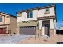 Charming two-story home with a two-car garage and low-maintenance landscaping at 480 Silverweed Ave, Henderson, NV 89044