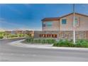A view of the Indigo community entrance sign showcasing stone accents at 513 Founders Creek Ave, North Las Vegas, NV 89084