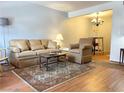 Bright living room shows hardwood floors, traditional furnishings, and neutral color scheme at 625 S Royal Crest Cir # 2, Las Vegas, NV 89169