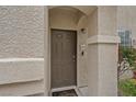 Inviting front entryway featuring a modern door, visible unit number, and welcome mat at 9050 W Warm Springs Rd # 1093, Las Vegas, NV 89148