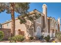 Attractive home featuring a private outdoor space and well-maintained yard at 10115 Tree Bark St, Las Vegas, NV 89183
