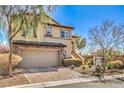Attractive two-story home with a well-maintained front yard and a two-car garage at 10490 Palmadora St, Las Vegas, NV 89178