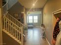 Welcoming foyer showcasing staircase and entry to the spacious main living area at 2204 Valdina St, Henderson, NV 89044