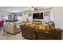 Spacious living room featuring tile floors and a comfortable seating arrangement at 2804 Colts Ave, North Las Vegas, NV 89032