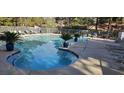 Community pool with ample lounge chairs and meticulously maintained landscaping at 2851 S Valley View Blvd # 1153, Las Vegas, NV 89102