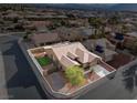 Aerial view showcasing property boundaries and landscaping with surrounding neighborhood homes at 5601 Quail Meadow Ct, Las Vegas, NV 89131