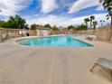 Community pool and deck offer a refreshing oasis for relaxation and recreation at 8748 Tomnitz Ave # 103, Las Vegas, NV 89178