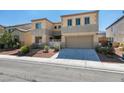 Charming two-story home with well-maintained desert landscaping and a two-car garage at 1609 Danielle Rebecca Ave, North Las Vegas, NV 89086