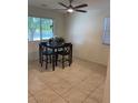 Cozy dining area with tile flooring and a ceiling fan at 1926 Neoga St, Las Vegas, NV 89115