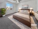 Tranquil main bedroom featuring a large window and contemporary decor at 3726 Shaving Shadows Ave, North Las Vegas, NV 89032