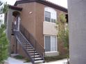 Two story condo with stairway entrance and small balcony space on an upper unit at 9000 Las Vegas Blvd # 2220, Las Vegas, NV 89123