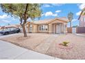Attractive home with low-maintenance landscaping, a tiled roof, and a private courtyard entrance at 9031 W Viking Rd, Las Vegas, NV 89147