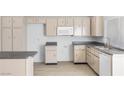 Bright kitchen featuring ample cabinet space and modern appliances at 100 Grandview Dr, Henderson, NV 89002