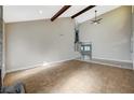 Spacious living room featuring vaulted ceilings, tile flooring, and ample natural light at 1904 Roxbury Ln, Las Vegas, NV 89119
