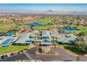 Breathtaking aerial shot of community amenities including pool, golf course, and clubhouse at 2147 Indigo Creek Ave, Henderson, NV 89012