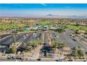 Stunning aerial view of the community clubhouse, golf course, and meticulously maintained grounds at 2147 Indigo Creek Ave, Henderson, NV 89012