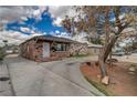 Brick home with stone accents and a long driveway at 218 S Bruce St, Las Vegas, NV 89101