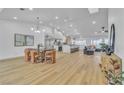 Spacious living area features a dining table, modern decor and lots of natural light at 3109 Siena Cir, Las Vegas, NV 89128