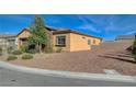 Well-maintained home featuring desert landscaping, a clean corner lot, and beautiful mountain views in the distance at 4459 S Glory Vine Ln, Pahrump, NV 89061