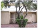 Enclosed patio area with mature landscaping at 4770 Topaz St # 113, Las Vegas, NV 89121