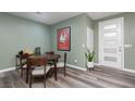 Cozy dining area featuring a wood table, comfortable seating, and stylish decor at 600 N Carriage Hill Dr # 1081, Las Vegas, NV 89138