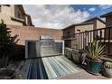 Outdoor kitchen area features a stainless steel grill and counter space, perfect for entertaining guests outdoors at 600 N Carriage Hill Dr # 1081, Las Vegas, NV 89138