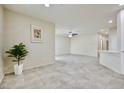 Spacious living space with tile flooring and an open layout at 6110 Scarlet Leaf St, Las Vegas, NV 89148