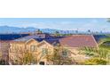 View of rooftops with solar panels, showcasing a skyline in the distance at 101 Morning Dr, Henderson, NV 89012