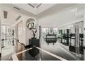 Modern foyer features sleek black floors, contemporary art, and ample natural light at 2857 Paradise Rd # 2704, Las Vegas, NV 89109