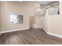 Bright living room with soaring ceilings and luxury vinyl plank flooring at 3305 Alcudia Bay Ave, Las Vegas, NV 89141