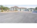 Charming single story home with desert landscaping, a three-car garage, and covered parking at 3365 Badura Ave, Las Vegas, NV 89118