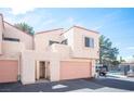 Charming townhome featuring a private garage and inviting entrance at 3369 Milenko Dr, Las Vegas, NV 89121