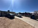 Modest single-story home with a lengthy driveway that can accommodate multiple vehicles at 3709 Perliter Ave, North Las Vegas, NV 89030