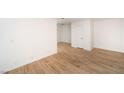Spacious living room features wood floors and neutral paint at 4941 River Glen Dr # 4, Las Vegas, NV 89103
