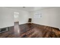 Spacious living room with updated flooring, fresh paint and abundant natural light at 517 Hopi Pl, Boulder City, NV 89005