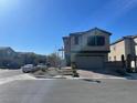 Charming two-story home with a well-maintained lawn and an attached two-car garage at 5773 Fresh Fields Ct, Las Vegas, NV 89118