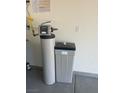 A water softener is installed in a home utility room, ensuring cleaner water at 5773 Fresh Fields Ct, Las Vegas, NV 89118