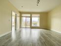 Spacious living room with plenty of natural light and sleek hardwood flooring at 8925 W Flamingo Rd # 310, Las Vegas, NV 89147