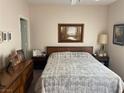Cozy main bedroom with neutral walls, framed artwork and classic furnishings at 9000 Las Vegas Blvd # 1271, Las Vegas, NV 89123